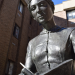 A statue of Florence Nightingale is located in the courtyard outside White Hall on the Kingston campus.