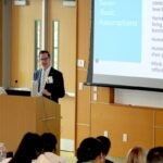 URI College of Nursing Dean Danny Willis delivers the keynote address as the college hosted the International Association for Human Caring 2025 annual conference June 26-28.