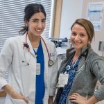 URI nursing student, Natalie Sidman of Cumberland works one-on-one with Alison Rosener, a registered nurse at the Miriam Hospital.