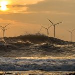 Wind turbines in waves