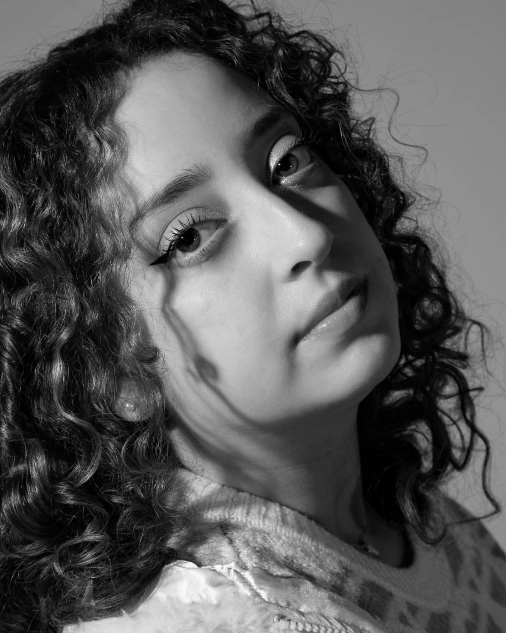 Black and white headshot of Jailene Guzmán