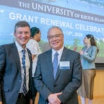 URI President Marc Parlange and pharmacy Professor Bongsup Cho, director of RI-INBRE, announced an additional $21 million in federal funding for the biomedical research network, increasing the organization's funding to more than $100 million.