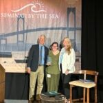 URI College of Pharmacy Dean Emeritus Paul Larrat receives the Norman A. Campbell Award for Ethics and Excellence in Health Care from Dean Kerry LaPlante (right) and Linda Campbell, daughter of Norman Campbell.