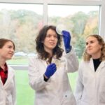 Assistant Professor Claudia Fallini (center) is pictured with graduate students Michelle Gregoire and Emily Potts.