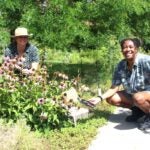 Yvonne Wingard, a URI College of the Environment and Life Sciences graduate and communications fellow (right), is coordinating the Heber W. Youngken Jr. Medicinal Garden audio tour along with garden Coordinator Elizabeth Leibovitz.