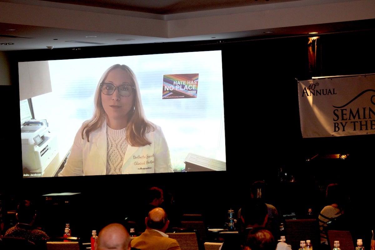 URI College of Pharmacy Clinical Professor Anita Jacobson virtually accepts the Dr. Norman A. Campbell Award for Excellence during the college’s 40th annual Seminar By the Se Northeast Regional Conference March 13.