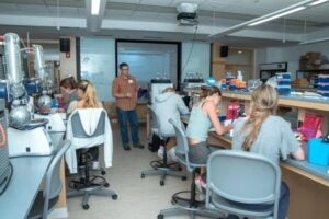 Students in the RI-INBRE Workforce Development Training program work in the advanced labs in Avedisian Hall on URI's Kingston campus.