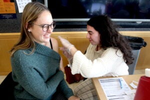 Pharmacy student Alexandra DeSantis administers a flu shot to fellow student Maddie Culina during the College of Pharmacy's immunization clinic Oct. 11.