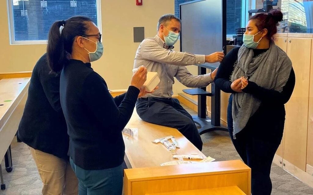 URI College of Pharmacy Clinical Professor Jeffrey Bratberg breaks down the science of vaccines, their effectiveness in preventing disease, and the dangers of under-vaccination among young students.