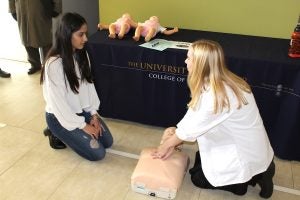 Student demonstrates CPR