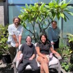 WELCOME: URI green spaces are open to the public, including the Youngken Medicinal Garden; shown, students AJ Chatterton, Ash Lilly and Kate Guinto with coordinator Elizabeth Leibovitz. (URI Photos / K. Curry)