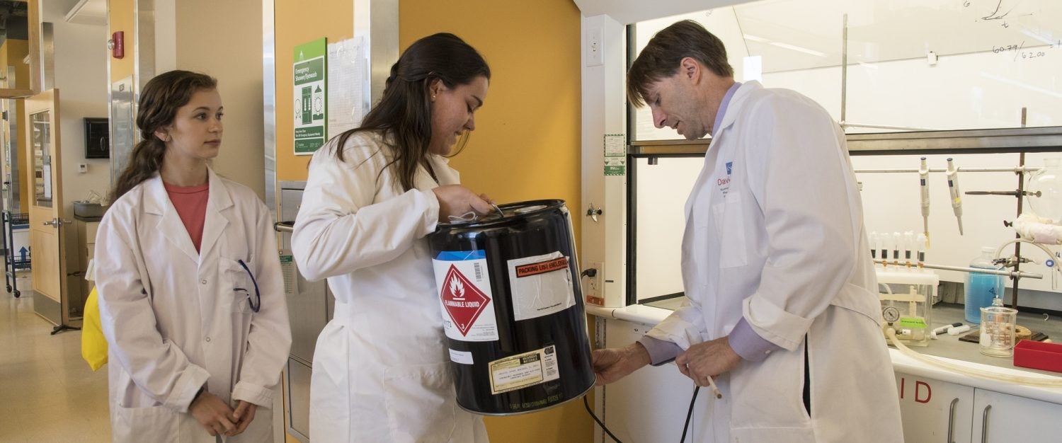 Dr. Rowley working with students in his lab