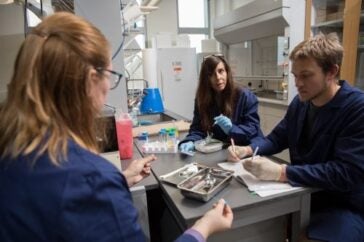 Lab manager Lisa Dowaliby (center) with Dr. Quinlan and lab alum Preston Steele