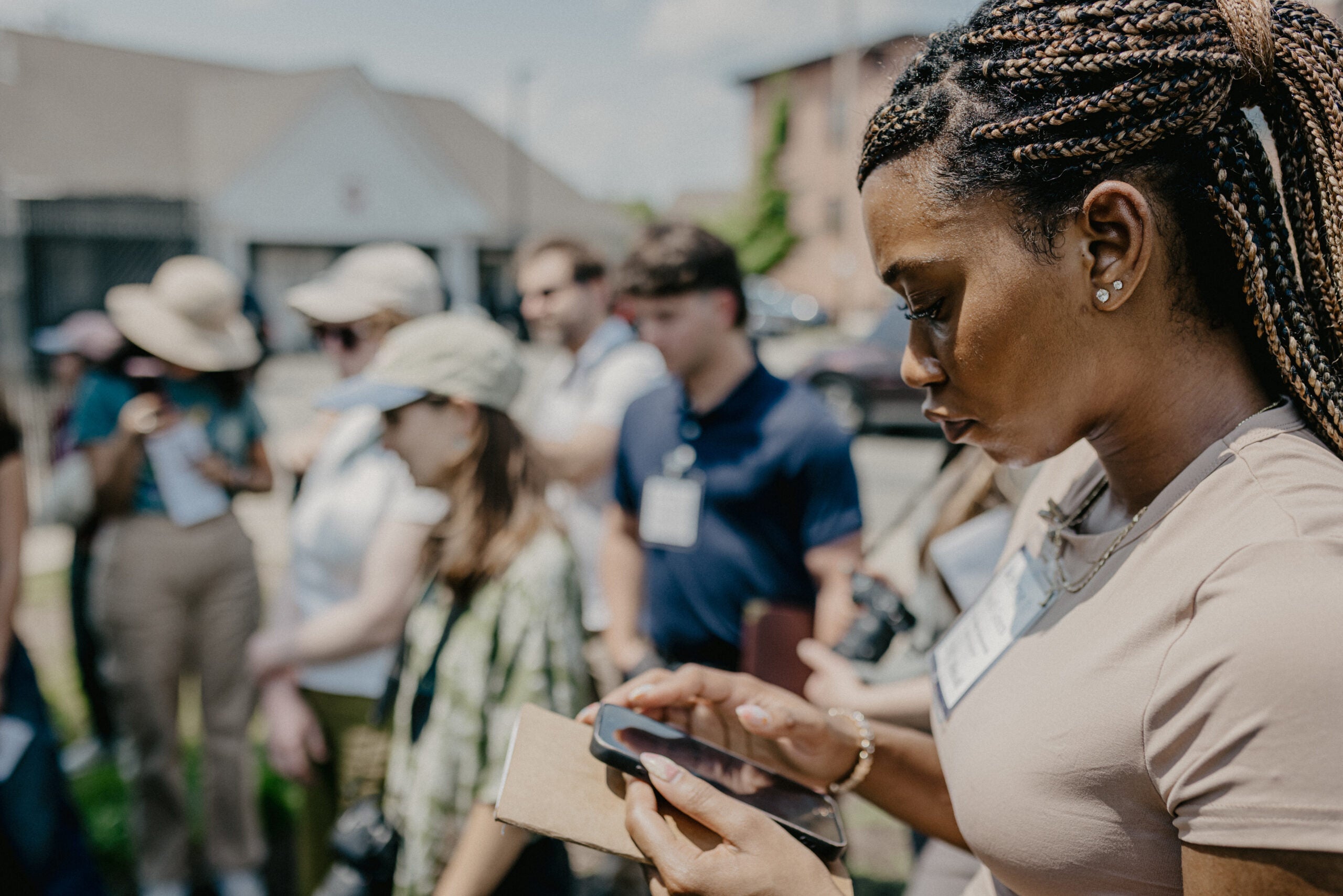 Jezell Green looks at her cell phone.