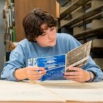 Molly McDonagh working in the archvies