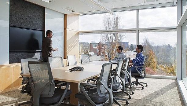 people sitting in a conference room