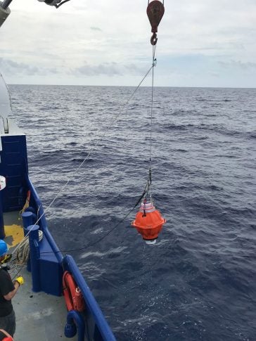 Bringing a recovered Sonardyne CPIES aboard