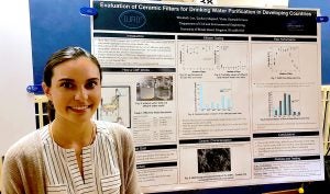 engineering student presents poster