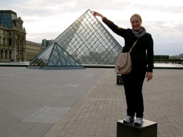 Student posing near the louvre pyramid