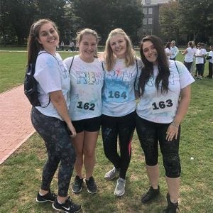 blog writer liv with some friends on the quad after a color run