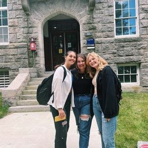 blog writer liv with her friends outside of ranger hall