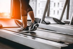 Treadmill with woman walking