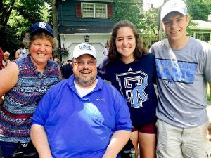 Marie Rodriguez is pictured with her mother, Linda, her father, Tony, and her brother, Kevin.