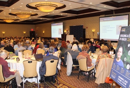 members of the community attending a university held conference