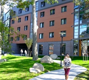 students walking in front of hillside hall