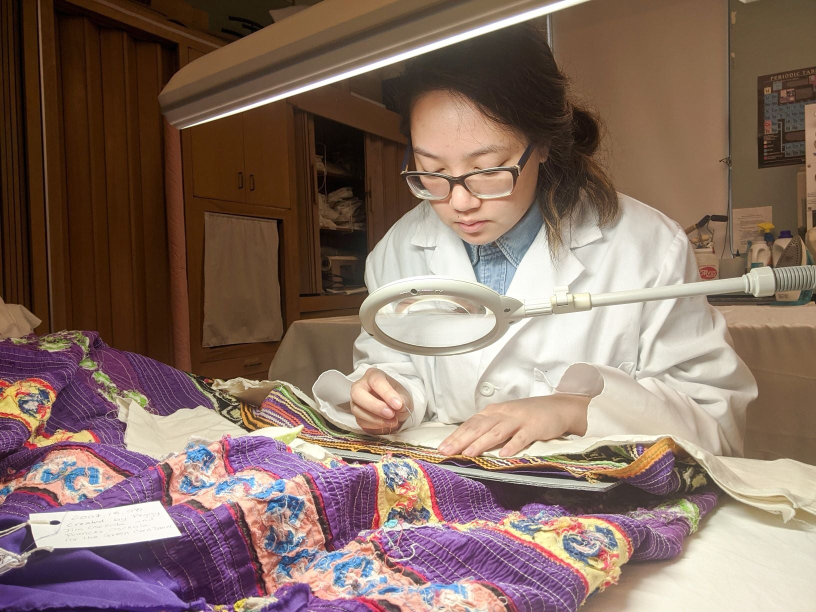 ms student restoring quilt