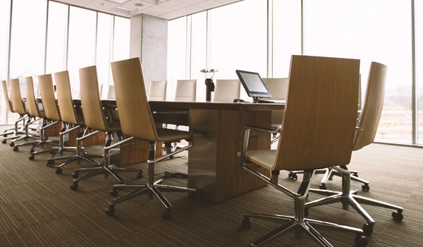 Conference room with chairs around a table