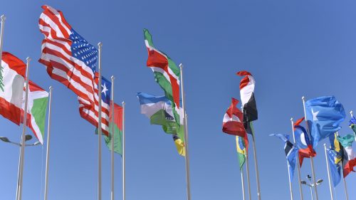 Flagpoles with flags from various countries