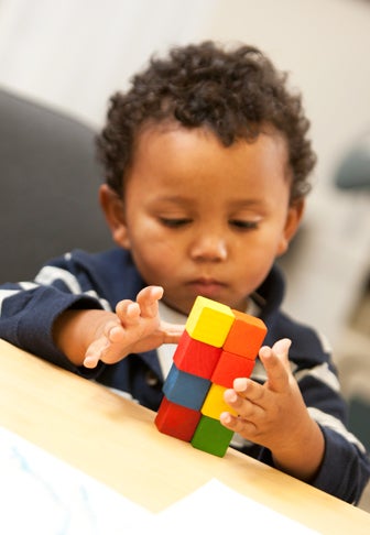 child playing with blocks