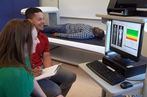 students viewing a bone density scan
