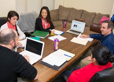 students in a group consultation
