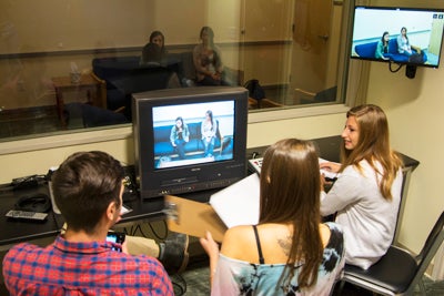 students observing a counseling session