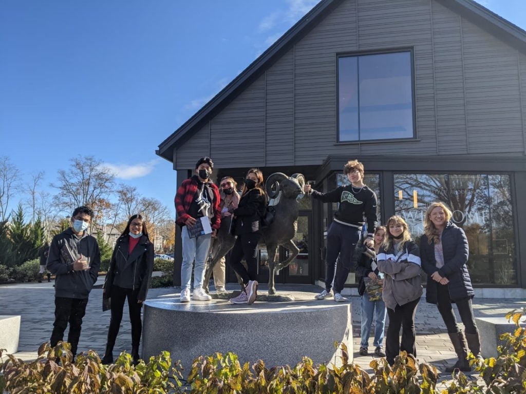 A group of high schoolers poses with Rhody Ram