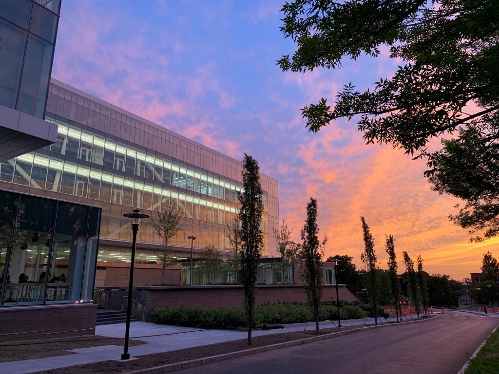 A view of the Fascitelli Center for Advanced Engineering at sunset