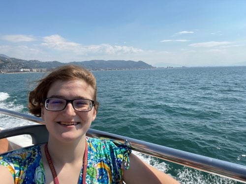 Student on a boat off the Amalfi coast