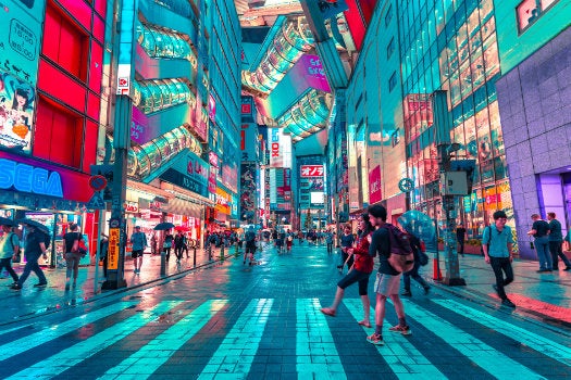 A brightly illuminated commercial street in Tokyo