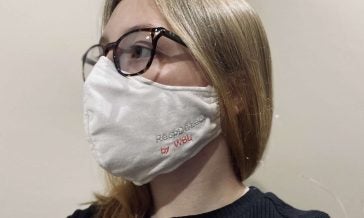 Michaela Bellisle wearing prototype of smart mask