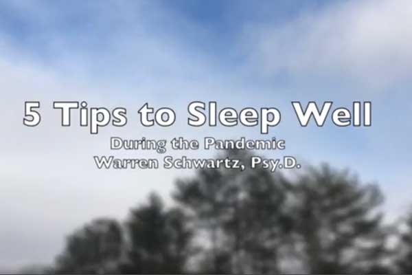 5 Tips to sleep well. Pine trees and blue cloudy sky in background