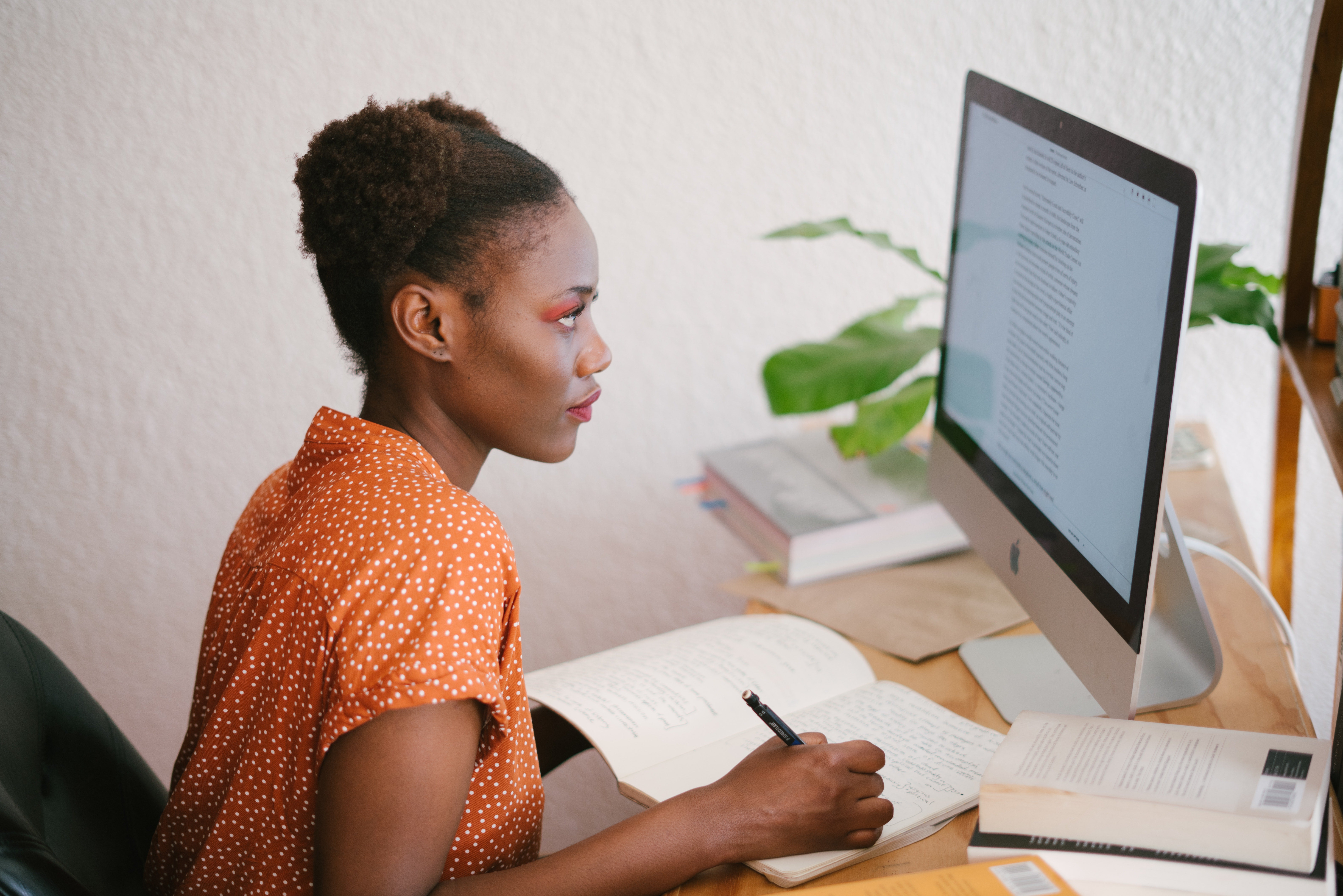 photo-of-woman-looking-on-computer-3059748