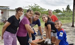A photo of Dr. Llorens at a community Garden