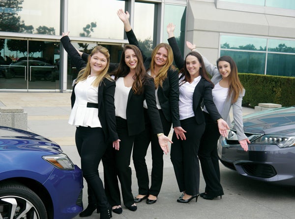 “This was an exciting opportunity that allowed us to showcase our marketing and presentation skills to real corporate executives,” says Alison Plunkett ’17 of North Kingstown, to left. Next to her are Tara Larson of North Smithfield, Samantha Valenza of Plainview, N.Y, Taylor Burns of Cranston, and Kristina Cheamitru of North Smithfield.