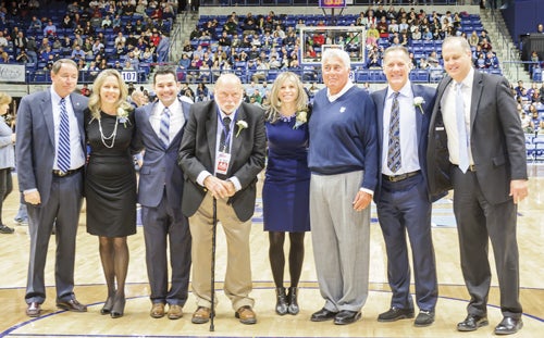 Left to right, URI President David M. Dooley, Stephanie Ulicny-Domin, Mike La Barbera, Tom Drennan, Kellie Cookus, Tom Cataldo, Mark Brockwell and Director of Athletics Thorr Bjorn.