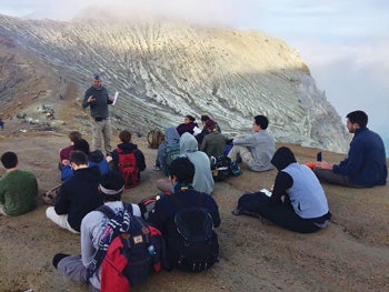 College of the Environment and Life Sciences professor Tom Boving leading a mountainside class during  J-term in Indonesia.