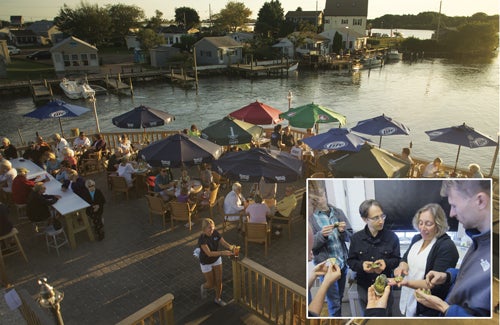 Diners enjoy ocean offerings at the Matunuck Oyster Bar, Matunuck, R.I.; right, Marta Gomez-Chiarri, professor and chair of URI’s Department of Fisheries, Animal and Veterinary Science, presents oyster research to colleagues.