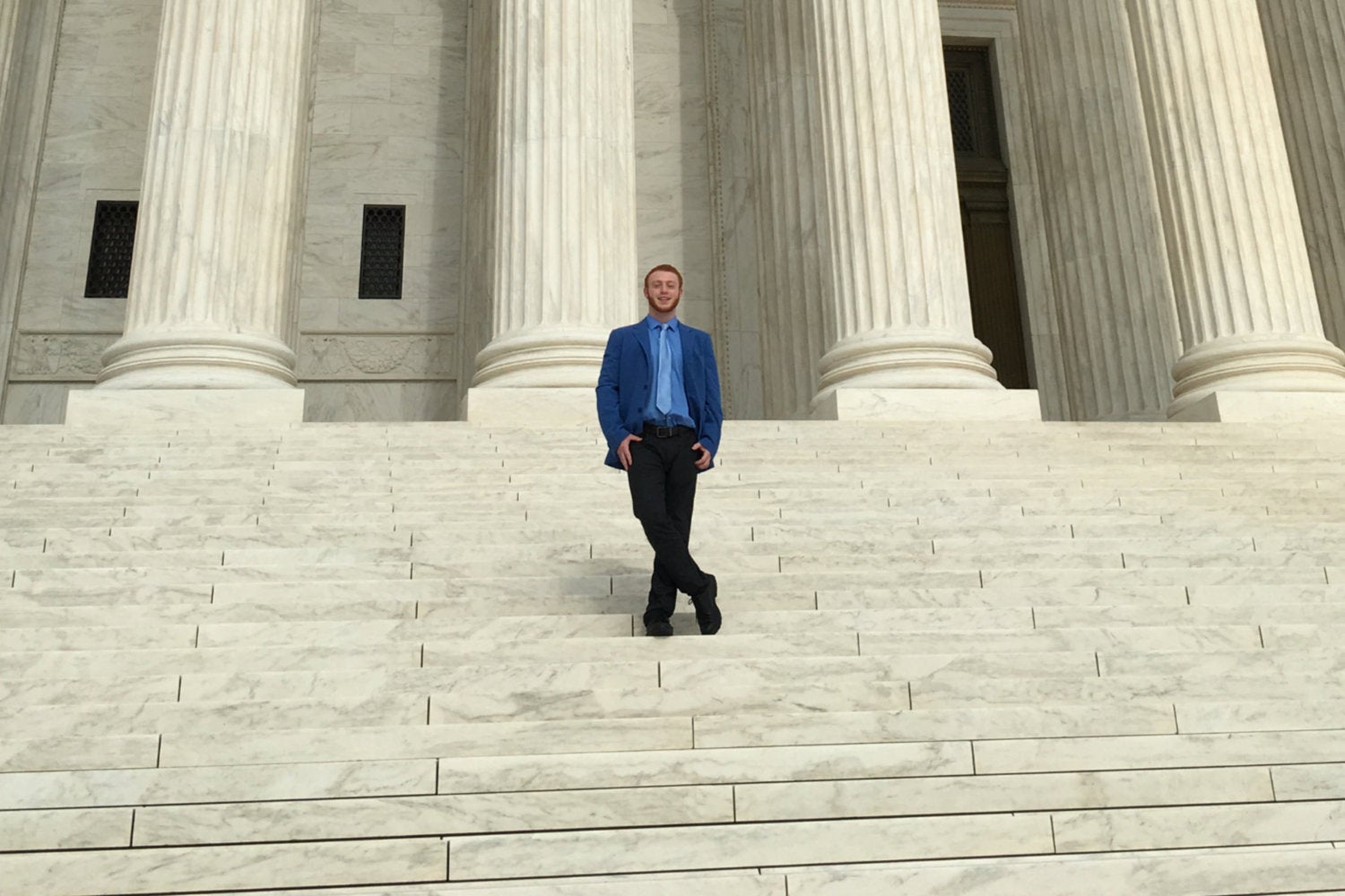 Scholarship recipient Sam Foer on the steps of the Supreme Court in DC