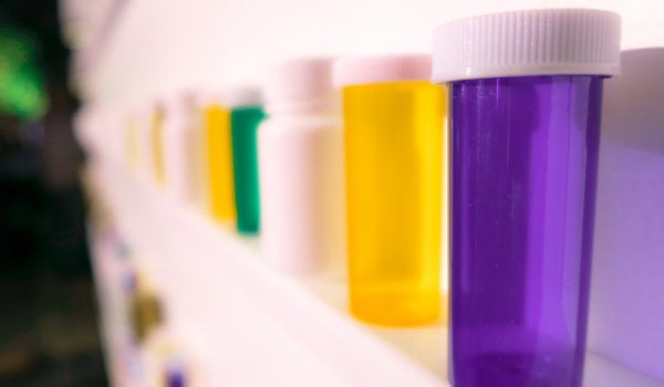 A row of multicolored vials